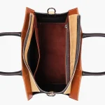 Stylish black vintage handbag with adjustable strap for everyday use