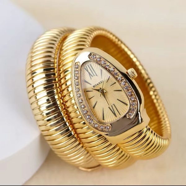 Feminine Gold Serpentine Watch For Her